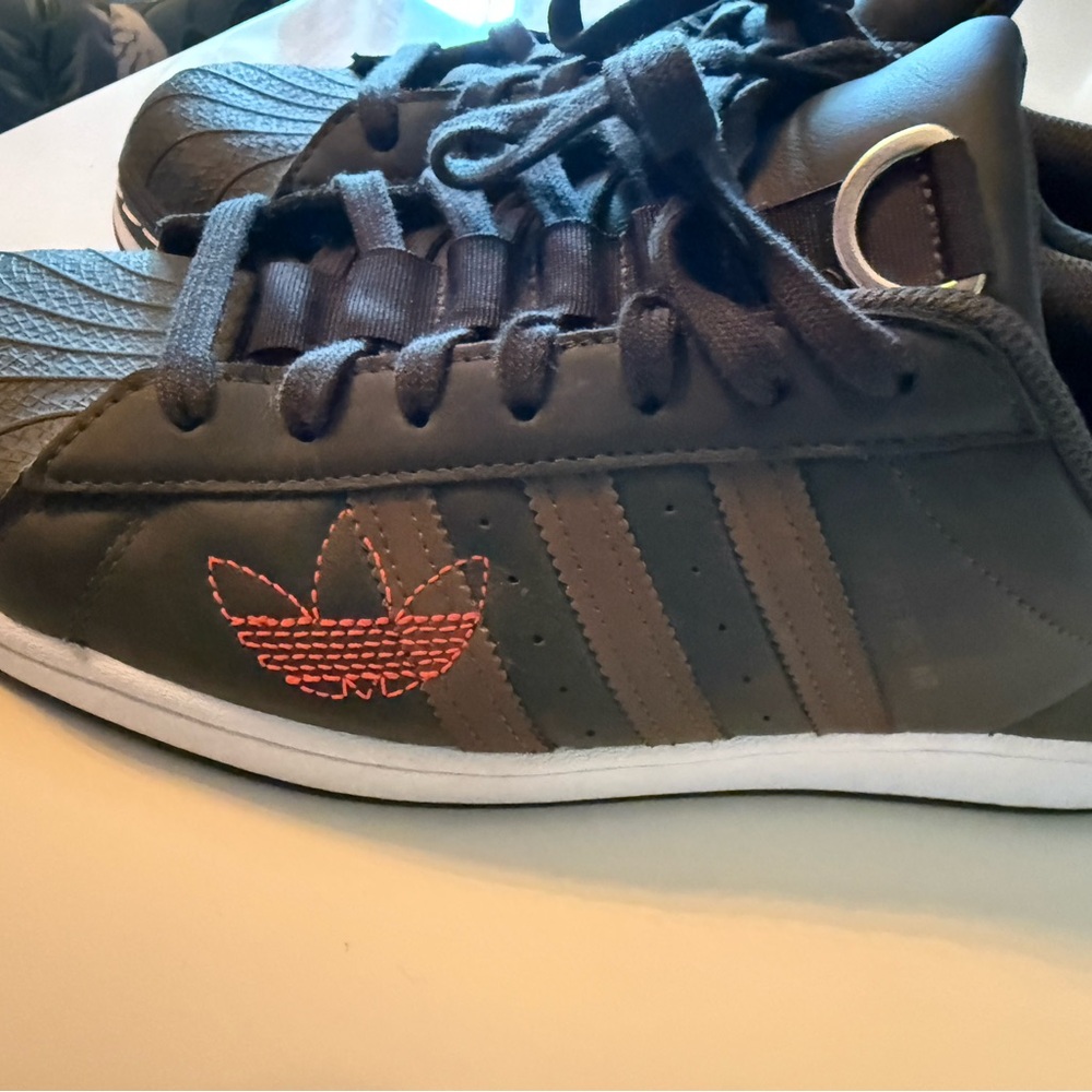 Adidas Black Sneakers with Signature Stripes
